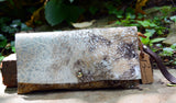 Metallic Brown and White Cowhide Clutch