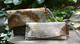 Metallic Tan and White Cowhide Clutch