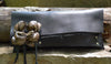 Black evening bag with leather flower